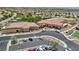An elevated view of the community center, highlighting the parking lot and meticulously maintained grounds at 2555 Moonlight Valley Ave, Henderson, NV 89044