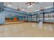 Spacious dance studio with wood flooring, mirrored wall, and ample lighting for various activities at 2555 Moonlight Valley Ave, Henderson, NV 89044