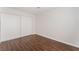 Spacious room with wood floors and a built-in wardrobe/closet at 2745 Poppyseed Way, Las Vegas, NV 89142