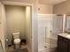 Bathroom featuring a glass enclosed shower and granite vanity at 2822 Chetco River St, Laughlin, NV 89029