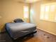 Bedroom with carpet flooring, ceiling fan, and bright shutters at 2822 Chetco River St, Laughlin, NV 89029
