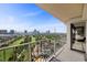 Large balcony overlooking the golf course and Las Vegas Strip with beautiful tile flooring at 3111 Bel Air Dr # 21A & 21C, Las Vegas, NV 89109