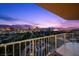 Enjoy stunning Las Vegas city views from this spacious balcony at dusk at 3111 Bel Air Dr # 21A & 21C, Las Vegas, NV 89109