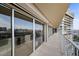 A long, spacious balcony with metal railings and a cityscape view at 3111 Bel Air Dr # 21A & 21C, Las Vegas, NV 89109