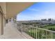 A long, spacious balcony with metal railings and a cityscape view at 3111 Bel Air Dr # 21A & 21C, Las Vegas, NV 89109