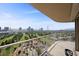 Enjoy the city views from this large balcony with white metal railings at 3111 Bel Air Dr # 21A & 21C, Las Vegas, NV 89109