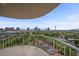 Enjoy the city views from this large balcony with white metal railings at 3111 Bel Air Dr # 21A & 21C, Las Vegas, NV 89109