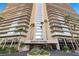 Elegant entrance of Regency Towers with manicured landscaping and sophisticated design elements at 3111 Bel Air Dr # 21A & 21C, Las Vegas, NV 89109