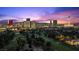 City view featuring Las Vegas Strip over lush green golf course and residential area at 3111 Bel Air Dr # 21A & 21C, Las Vegas, NV 89109