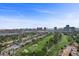 Expansive Las Vegas city view overlooking a golf course and residential area at 3111 Bel Air Dr # 21A & 21C, Las Vegas, NV 89109