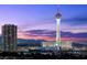 Nighttime city view featuring the Stratosphere Hotel and surrounding cityscape at 3111 Bel Air Dr # 21A & 21C, Las Vegas, NV 89109