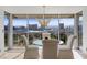 Bright dining area with expansive windows offering panoramic views of the cityscape at 3111 Bel Air Dr # 21A & 21C, Las Vegas, NV 89109