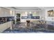Modern kitchen with white cabinets, granite counters, stainless steel appliances, and sleek design at 3111 Bel Air Dr # 21A & 21C, Las Vegas, NV 89109