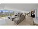 Expansive open-concept living area with city views, comfortable seating, and ample entertaining space at 3111 Bel Air Dr # 21A & 21C, Las Vegas, NV 89109