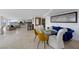 Open-concept living area features dining space, comfortable seating, and elegant decor at 3111 Bel Air Dr # 21A & 21C, Las Vegas, NV 89109