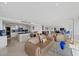 Bright living area featuring an open layout, city views, and stylish furnishings, seamlessly connecting living spaces at 3111 Bel Air Dr # 21A & 21C, Las Vegas, NV 89109