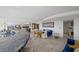 Spacious living area with granite bar, seating, tile floors, and fireplace at 3111 Bel Air Dr # 21A & 21C, Las Vegas, NV 89109
