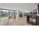 Bright, open concept condo living room with elegant furniture and panoramic city views at 3111 Bel Air Dr # 21A & 21C, Las Vegas, NV 89109