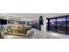 Stunning main bedroom with floor-to-ceiling windows offering panoramic city views, accented by a mirrored wall at 3111 Bel Air Dr # 21A & 21C, Las Vegas, NV 89109
