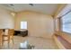 Open living area boasts natural light, tiled floors, and a built-in window bench at 3127 Kennewick Dr, Las Vegas, NV 89121
