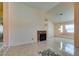 Living room featuring tile floors and a brick fireplace at 3127 Kennewick Dr, Las Vegas, NV 89121