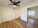 Bedroom features wood-look flooring, ceiling fan, closet and lots of natural light at 3270 Liahona Way, Las Vegas, NV 89121