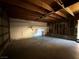 A large two car garage with painted walls and a workbench at 3270 Liahona Way, Las Vegas, NV 89121
