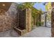 Inviting courtyard features stone accents and a calming water feature fountain at 33 Promontory Ridge Dr, Las Vegas, NV 89135