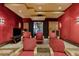 Comfortable home theater with plush seating, perfect for movie nights at 33 Promontory Ridge Dr, Las Vegas, NV 89135
