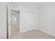 Bedroom featuring plush carpet, closet, and access to other rooms at 3621 Arcadian Sea St, Las Vegas, NV 89106