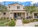 Inviting townhome features a well-manicured front yard and a charming covered porch at 3621 Arcadian Sea St, Las Vegas, NV 89106