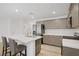 Well-equipped kitchen featuring white countertops, gray cabinetry, and stainless steel appliances at 3621 Arcadian Sea St, Las Vegas, NV 89106
