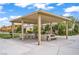 Covered picnic area featuring stone picnic tables in a community at 3621 Arcadian Sea St, Las Vegas, NV 89106