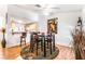 Bright dining area with modern table set and decorative art piece at 3673 Ian Thomas St # 201, Las Vegas, NV 89129