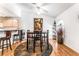 Well-lit dining space with stylish table, chairs, and a decorative area rug at 3673 Ian Thomas St # 201, Las Vegas, NV 89129