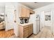Practical kitchen area with modern appliances and adjacent access to the living room at 3673 Ian Thomas St # 201, Las Vegas, NV 89129
