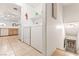 Laundry room featuring washer and dryer, with access to the kitchen and stairs at 3673 Ian Thomas St # 201, Las Vegas, NV 89129