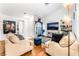 Inviting living room featuring hardwood floors, plush seating, and stylish decor at 3673 Ian Thomas St # 201, Las Vegas, NV 89129