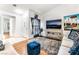 Comfortable living room with plush rug, modern TV console, and bright, airy feel at 3673 Ian Thomas St # 201, Las Vegas, NV 89129