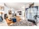 Bright living room with hardwood floors, neutral paint, and comfortable seating arrangement at 3673 Ian Thomas St # 201, Las Vegas, NV 89129