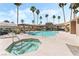 Inviting community pool area with ample lounge seating and shaded cabanas for relaxation and socializing at 3673 Ian Thomas St # 201, Las Vegas, NV 89129