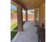 Covered patio area provides an ideal space for outdoor relaxation and entertaining with landscape views at 3712 Garnet Heights Ave, North Las Vegas, NV 89081