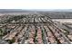 Stunning aerial perspective of a large, well-planned community with uniform rooftops at 4408 Oasis Plains Ave, North Las Vegas, NV 89085