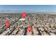 Attractive aerial view with street markers of a well-spaced residential area near the mountains at 4408 Oasis Plains Ave, North Las Vegas, NV 89085