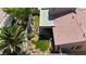 A high angle captures backyard oasis with serene waterfall and spacious covered patio at 4408 Oasis Plains Ave, North Las Vegas, NV 89085