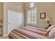 Comfortable bedroom with neutral walls, and plenty of natural light at 4408 Oasis Plains Ave, North Las Vegas, NV 89085