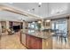 View of kitchen featuring granite countertops, stainless appliances, and an island with seating at 4408 Oasis Plains Ave, North Las Vegas, NV 89085