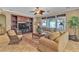 Cozy living room features a built-in entertainment center and comfortable seating arrangement at 4408 Oasis Plains Ave, North Las Vegas, NV 89085