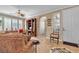 Bright and airy living room with shuttered windows and tile flooring at 4408 Oasis Plains Ave, North Las Vegas, NV 89085