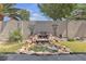 Picturesque backyard water feature, adding a tranquil ambiance to the outdoor space at 4408 Oasis Plains Ave, North Las Vegas, NV 89085